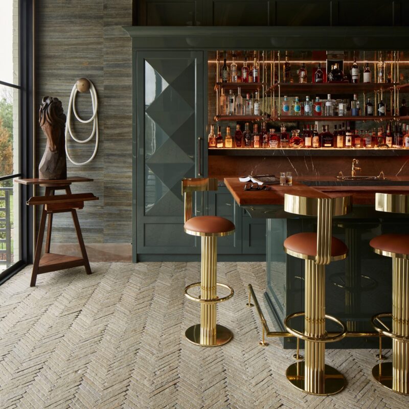 Limestone Herringbone Floor Tiles In A Luxury Bar