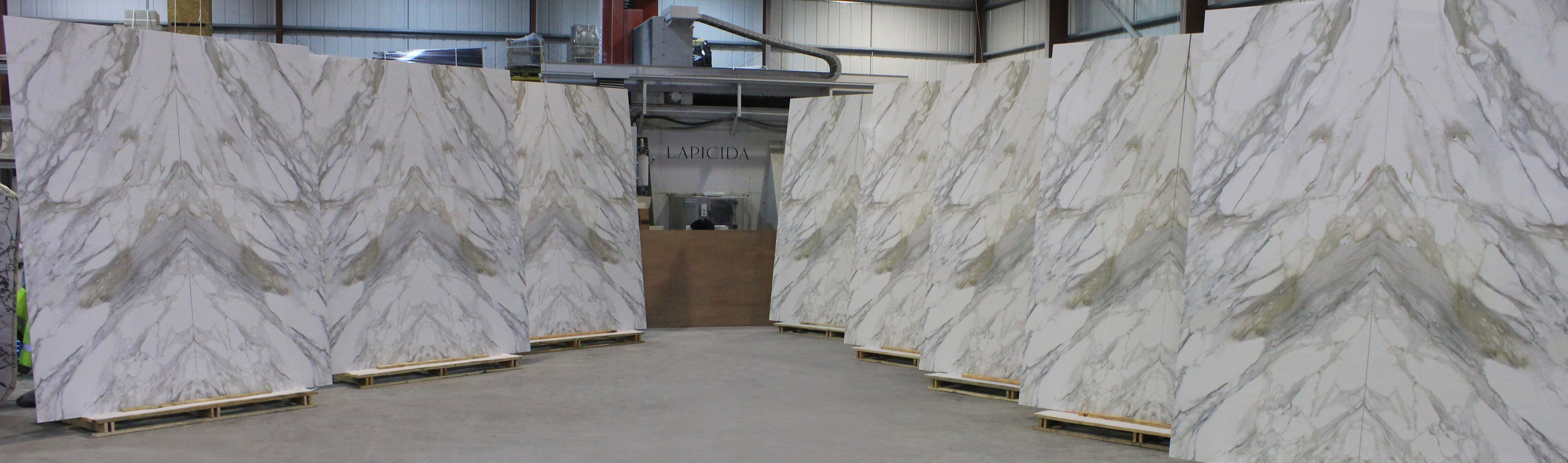 Lapicida Massa Doro Bookmatch porcelain tiles at Lapicida Yorkshire headquarters