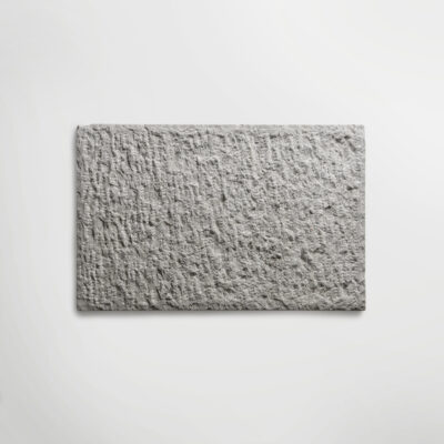 Lapicida Biblical Dark Grey Tile recreates distressed stone wall