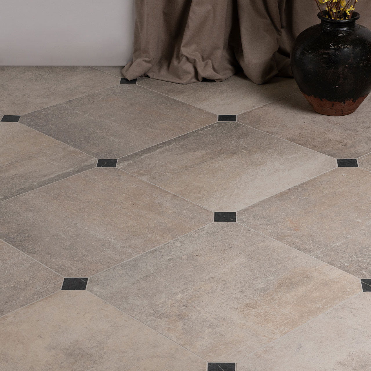 Lapicida flooring Montpellier Taupe Octagon slabs with Antique Marble Nero Marquina Inserts