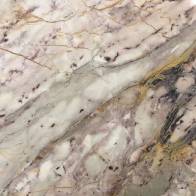Lapicida Breccia van Gogh is a striking natural marble with pinks, purples, yellows and greys