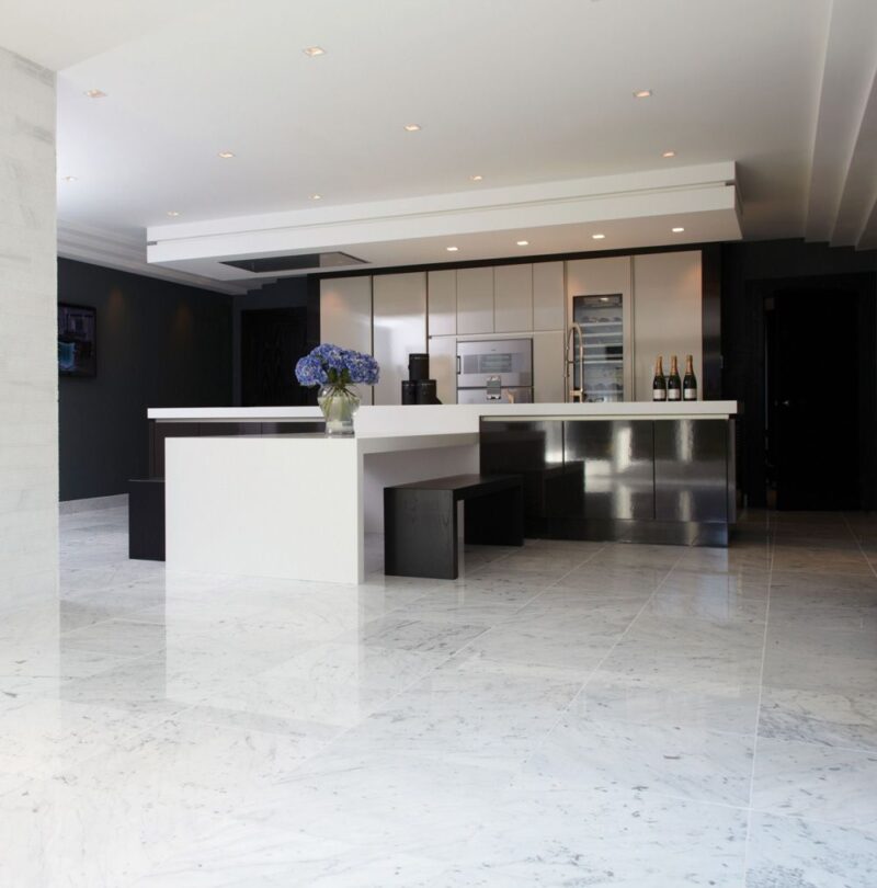 Lapicida Carrara polished marble is ideal for open plan living including kitchen projects