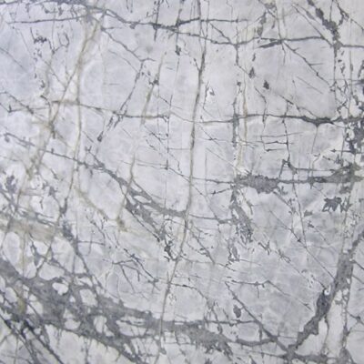 Lapicida Cote D'Azur is an elegant marble with a light grey and white background and random veining